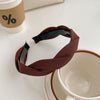 Headband with twist