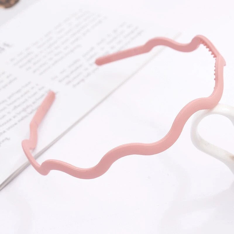 Pink plastic headband