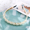 white pearl headband woman