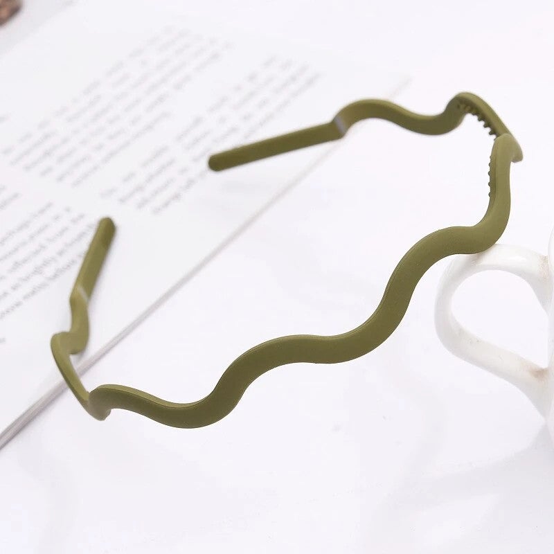 Green plastic headband for sport