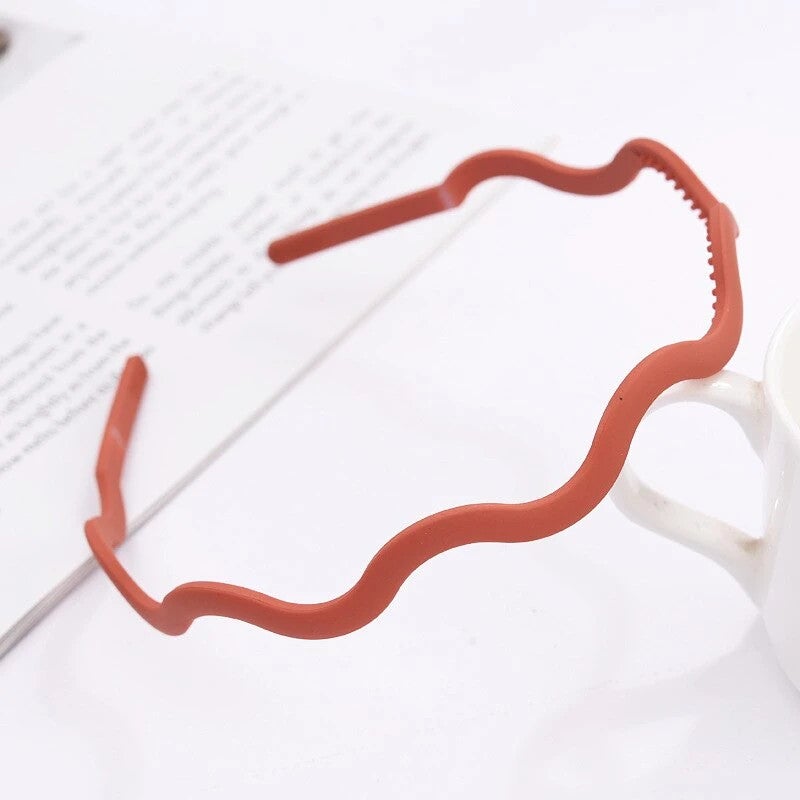 orange plastic headband for sport